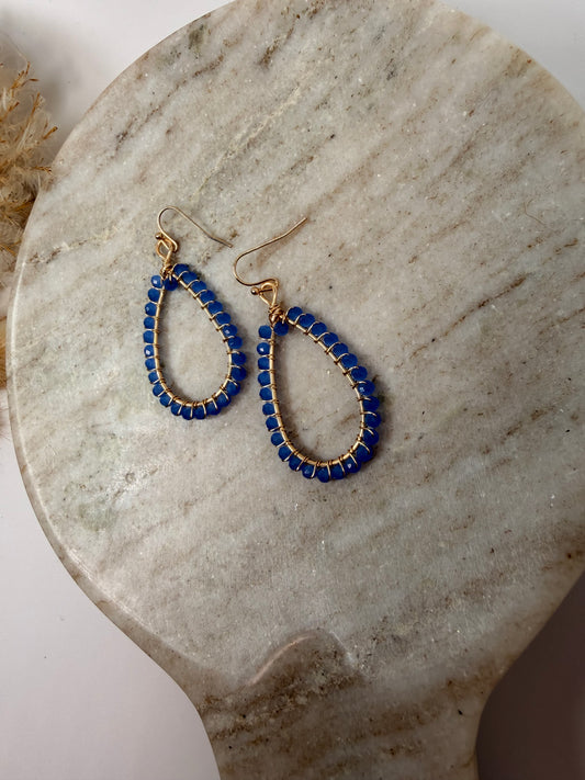 Blue wire wrapped tear drop gold earrings