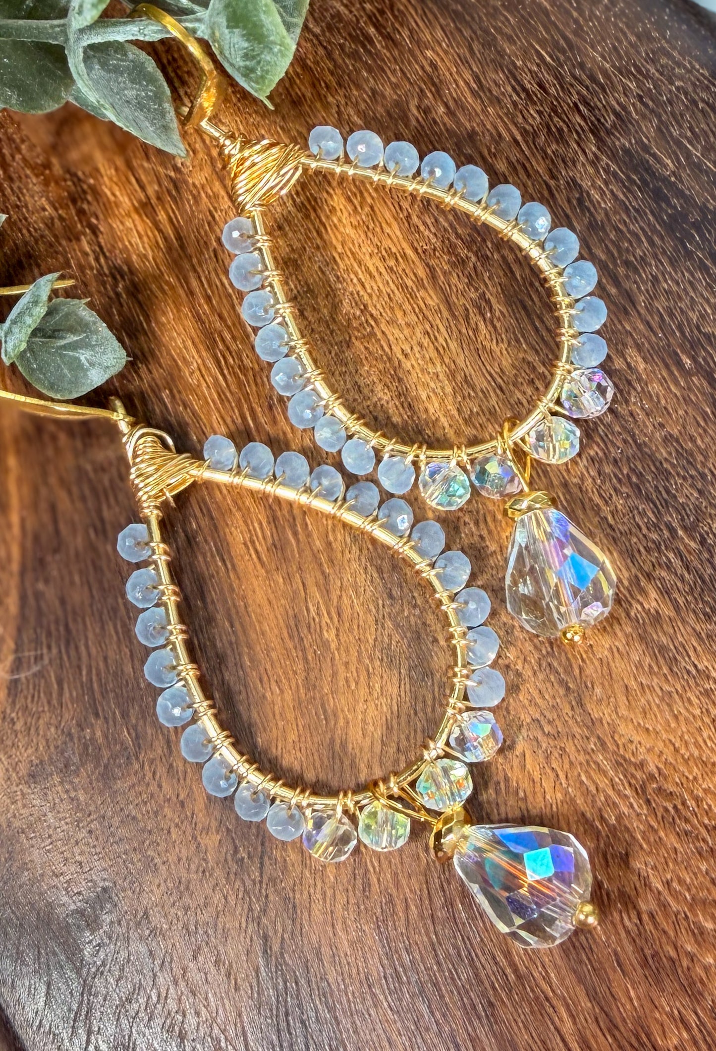 Milk sky blue crystals wrapped with golden wire with hand cut faceted crystal teardrop bead earrings