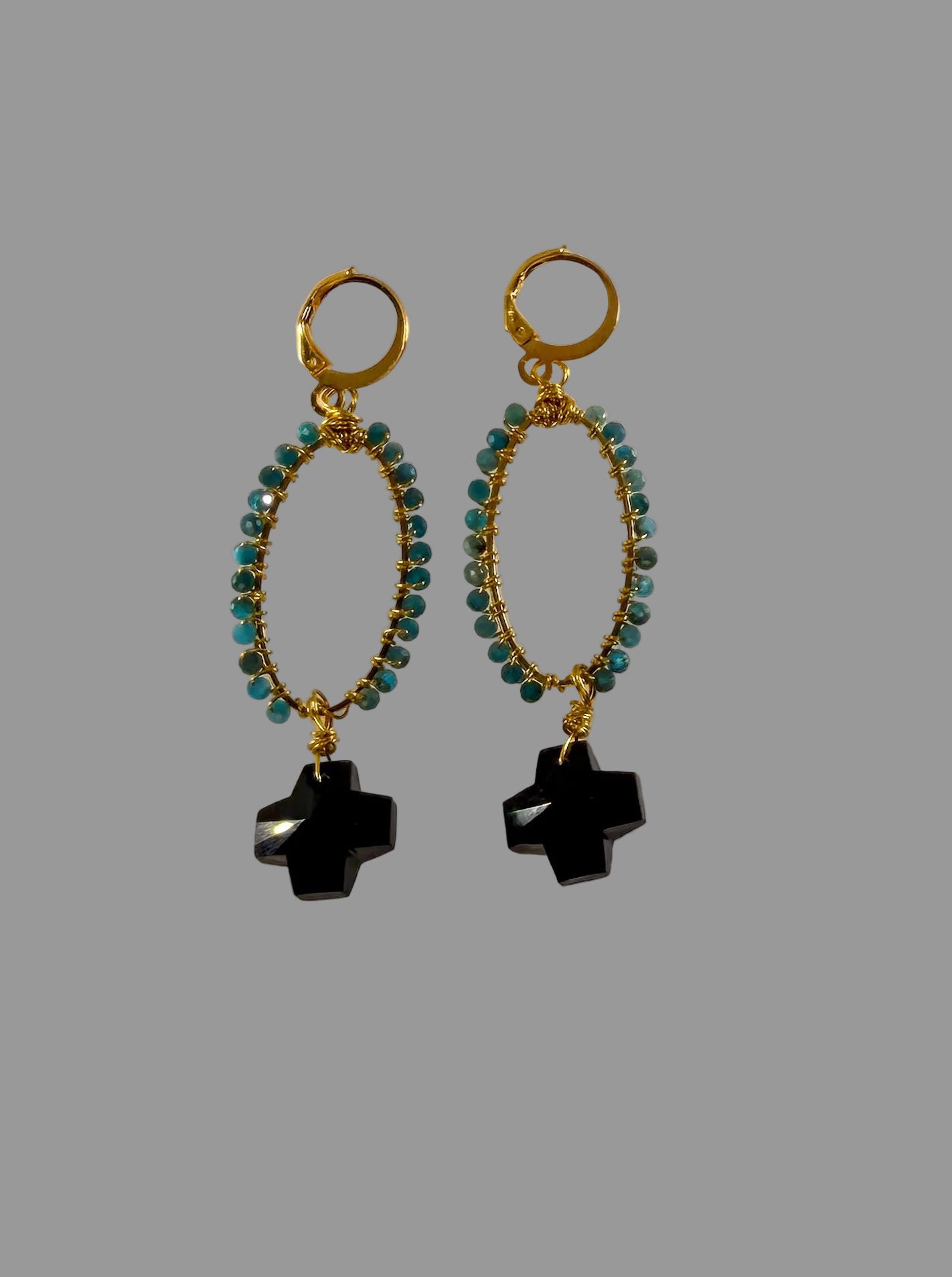 Golden Wire Wrapped Blue Jade Stones with Black Crystal Cross Accent Dangle Earrings