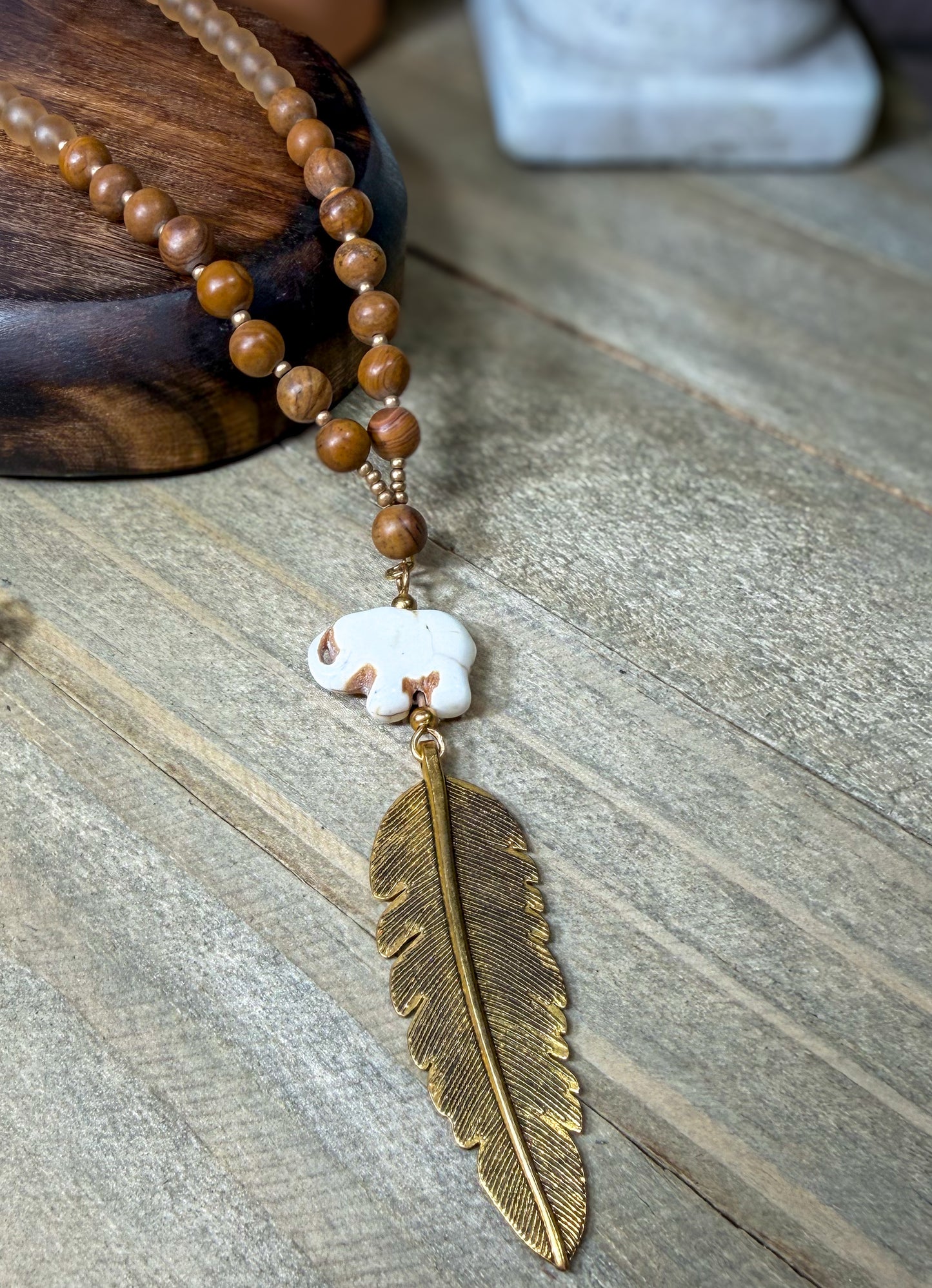 Hand Carved Stone Elephant Charm with Dark Gold Feather Pendant Long Necklace with Stone beads accents