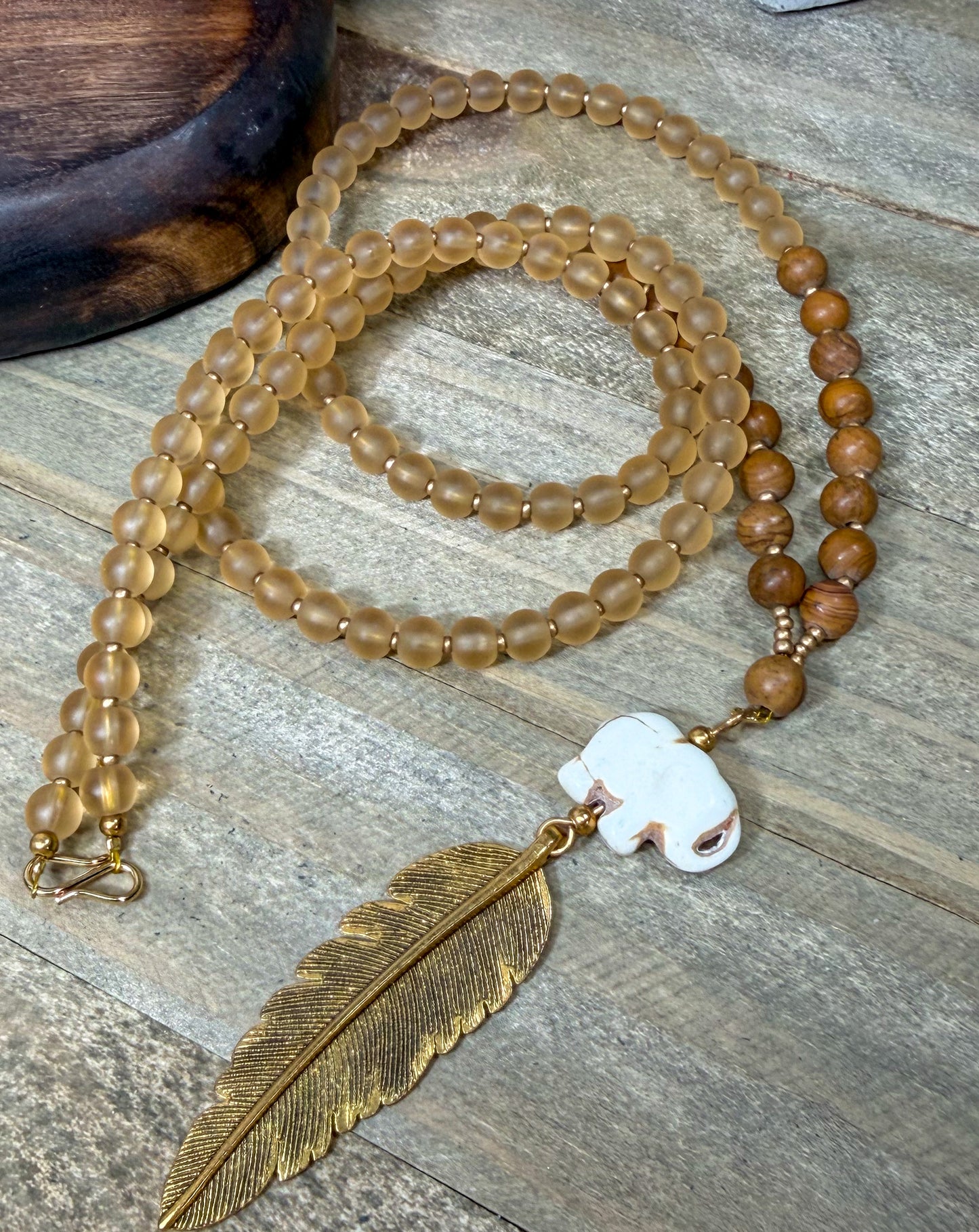Hand Carved Stone Elephant Charm with Dark Gold Feather Pendant Long Necklace with Stone beads accents