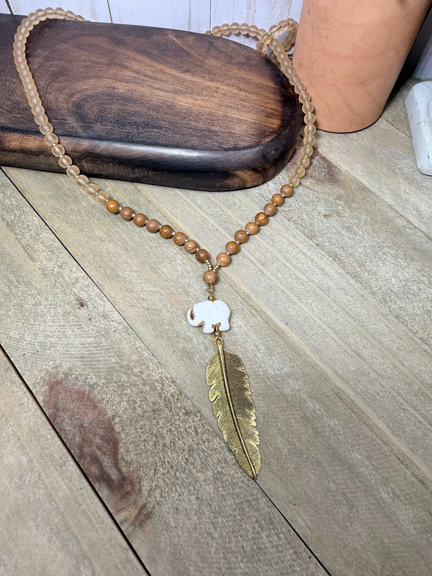 Hand Carved Stone Elephant Charm with Dark Gold Feather Pendant Long Necklace with Stone beads accents