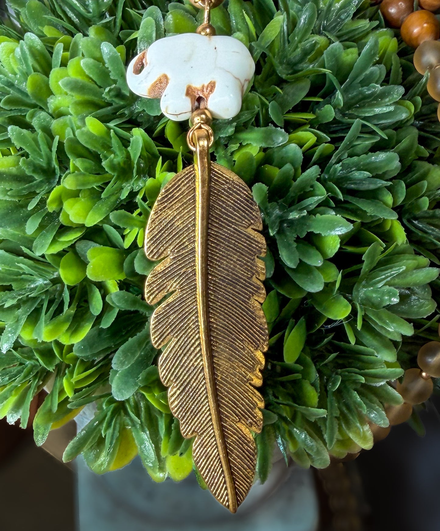 Hand Carved Stone Elephant Charm with Dark Gold Feather Pendant Long Necklace with Stone beads accents