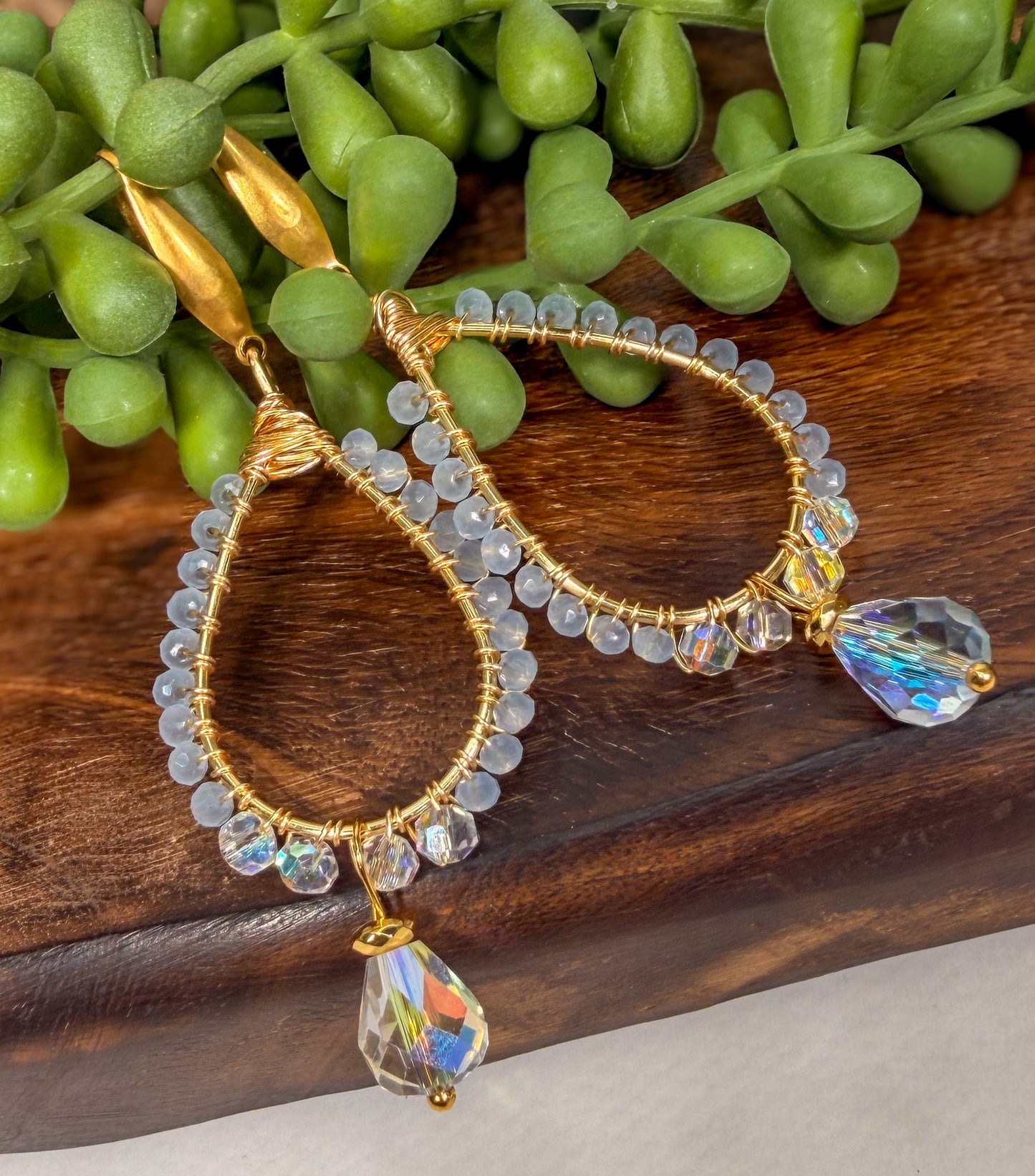 Milk sky blue crystals wrapped with golden wire with hand cut faceted crystal teardrop bead earrings