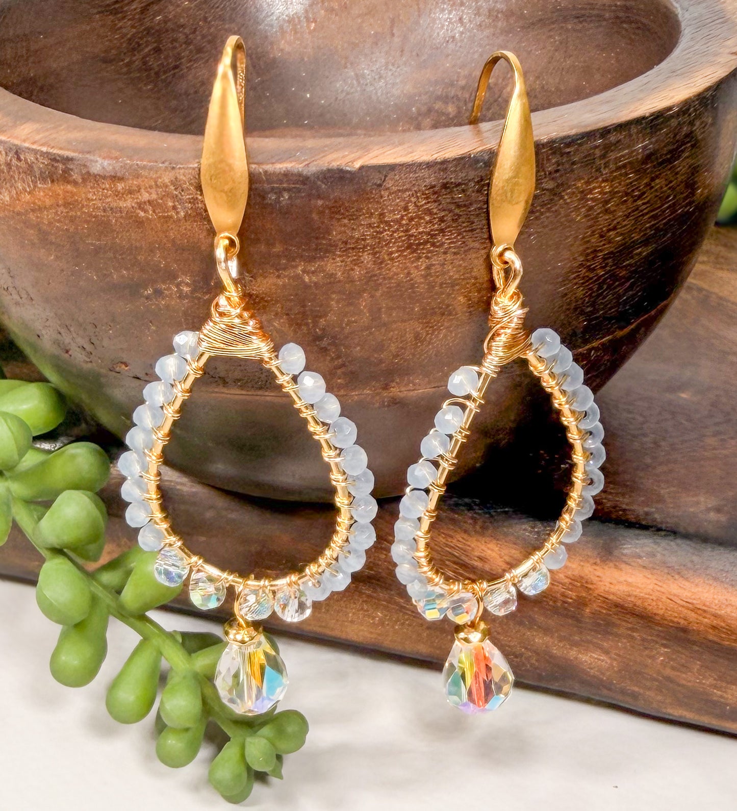 Milk sky blue crystals wrapped with golden wire with hand cut faceted crystal teardrop bead earrings