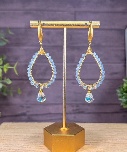 Milk sky blue crystals wrapped with golden wire with hand cut faceted crystal teardrop bead earrings