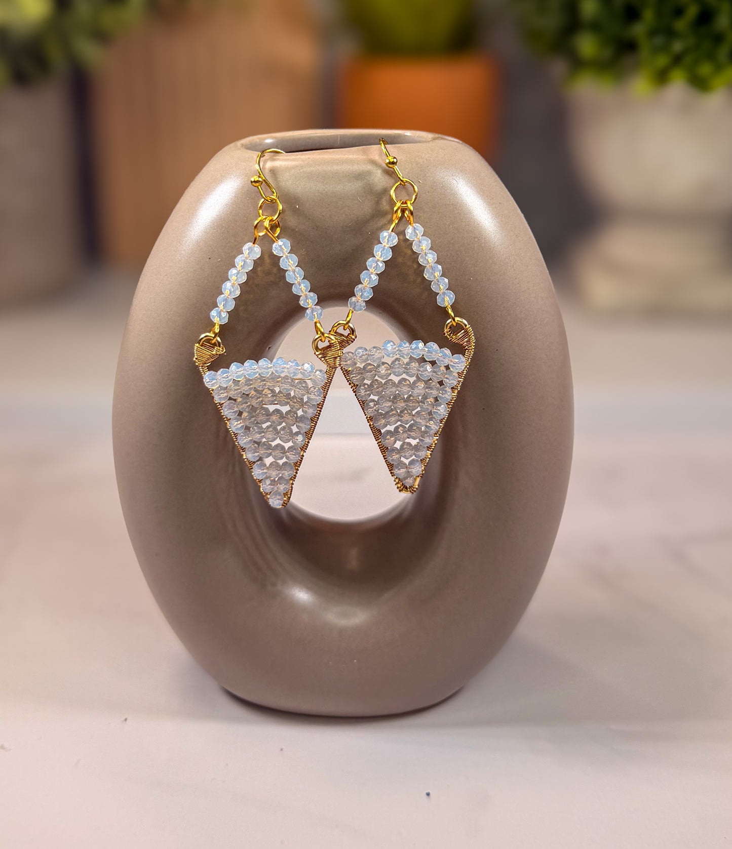White Crystal Faceted Drop Diamond Shaped Earrings with unique design and Golden Accents