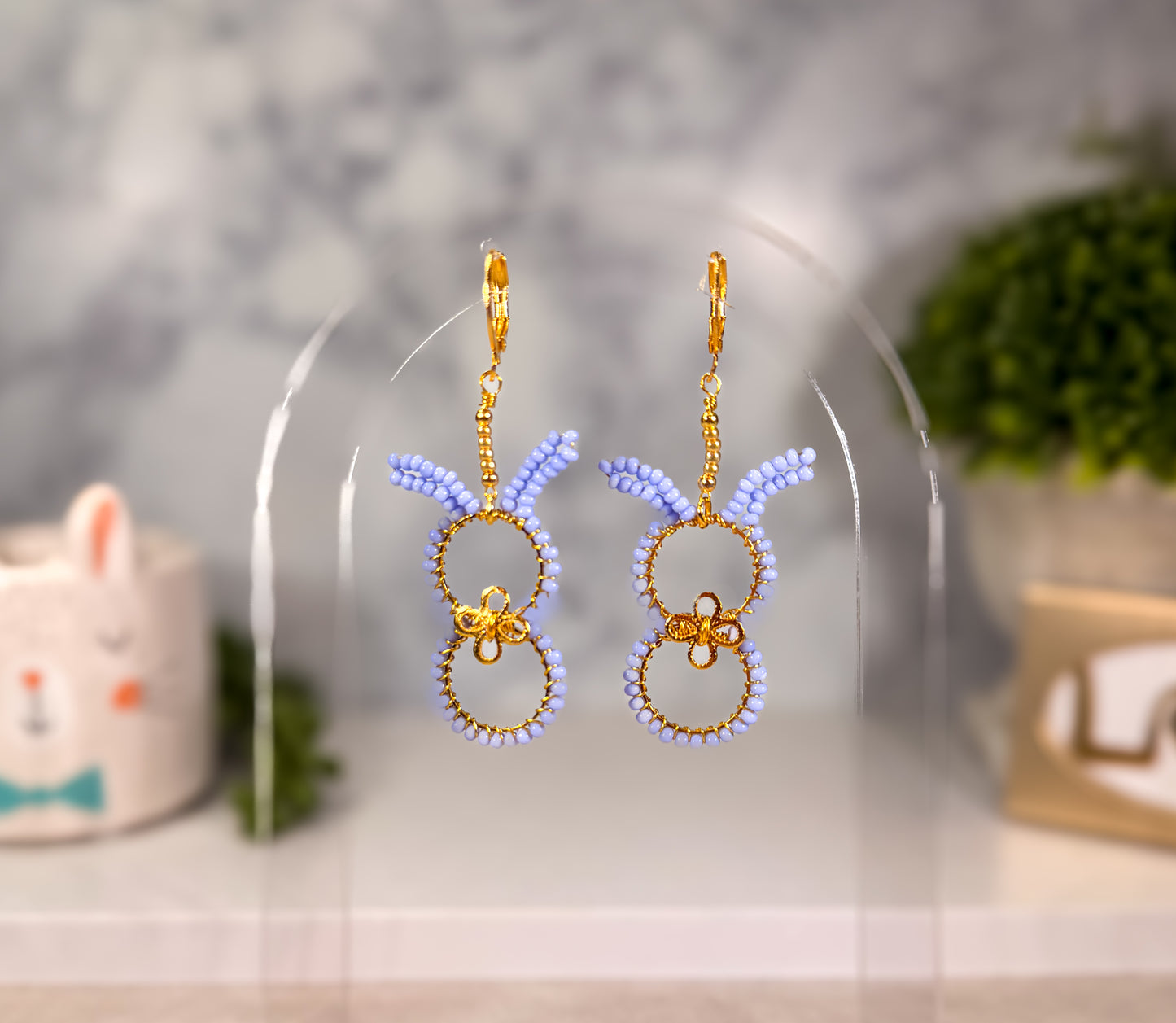 Easter Bunny in lilac with 14k gold bowtie and huggie closure earrings in a warm golden color